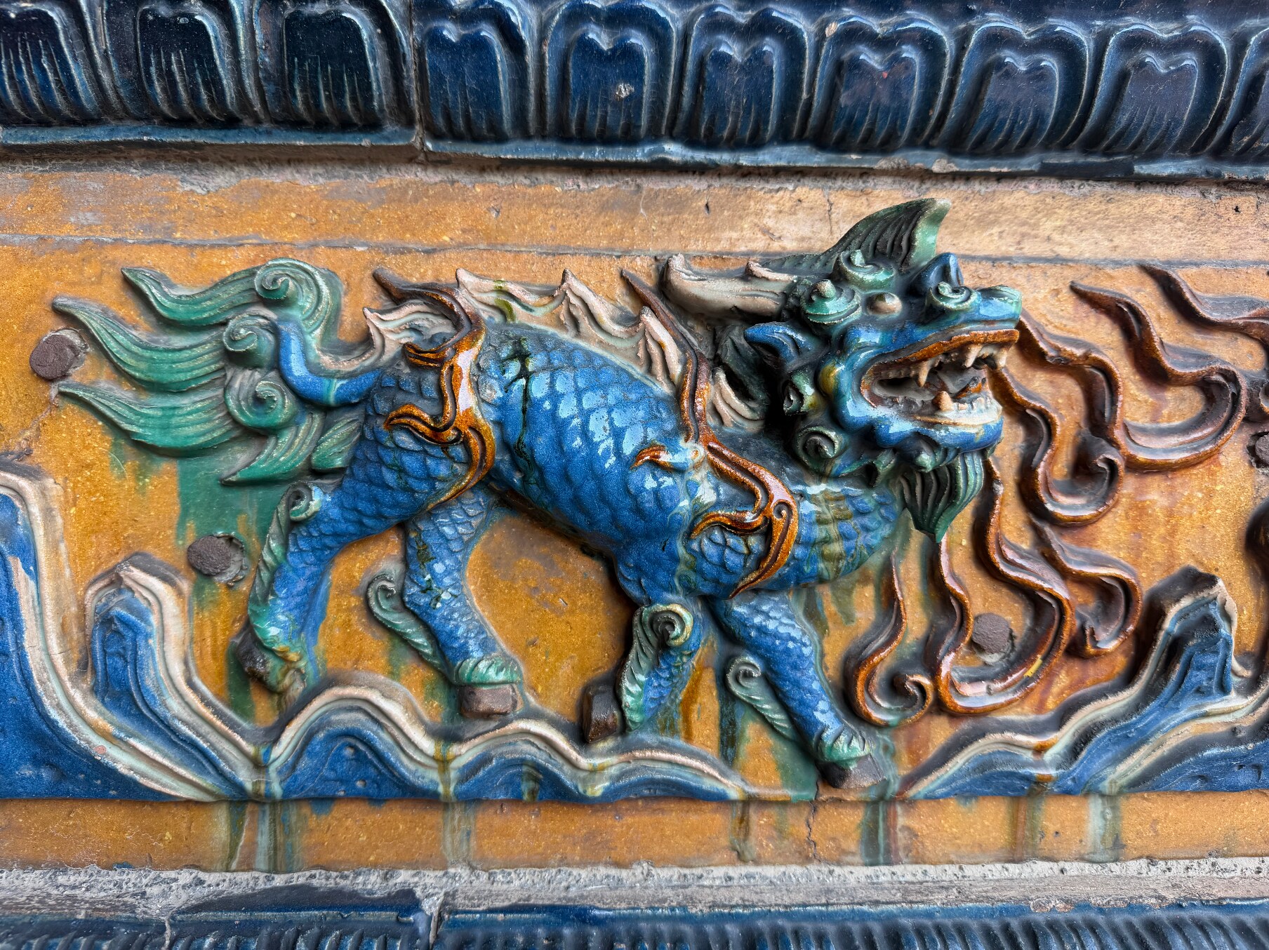 A glazed dragon architectural detail in Mukden